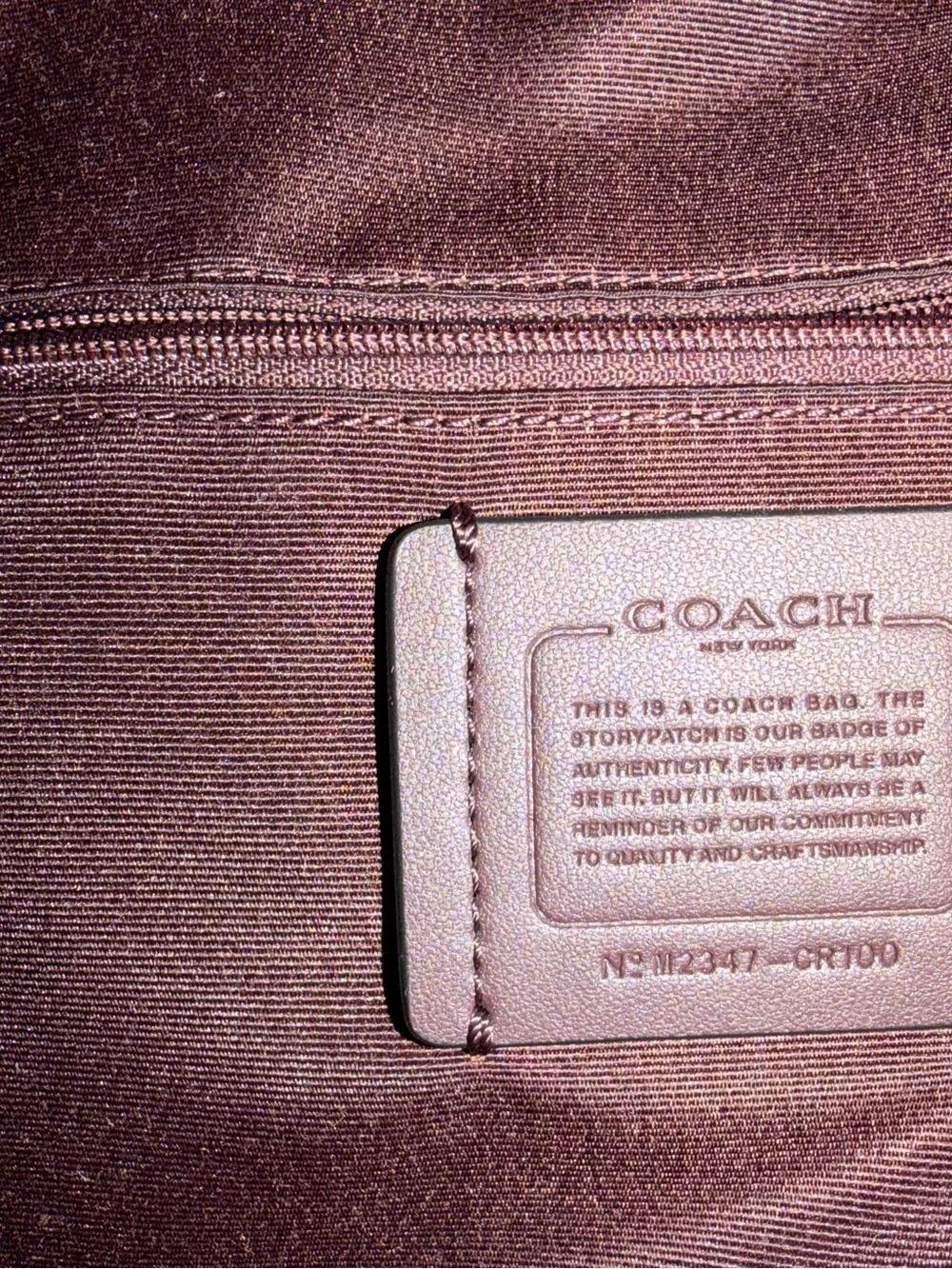 Coach Black Leather Drawstring Backpack with Front Zip Compartment